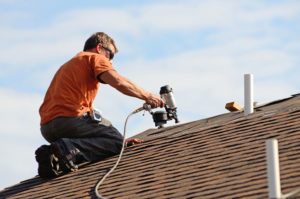 contractor working on a roofing installation