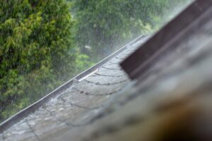 rain pounding down on roof during hurricane season
